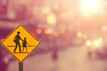 School sign.Traffic sign road on blur road