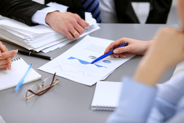 Close up of business people at meeting