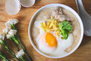 rice porridge with ground pock vintage tone with white flowers o