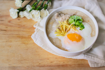 rice porridge with ground pock vintage tone with white flowers