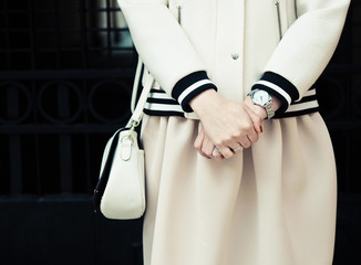 Beautiful fashionable woman on the city street.