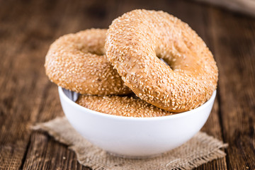 Fresh Bagels with Sesame (close-up shot; selective focus)