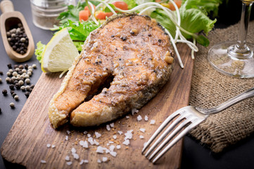 salmon steak with vegetables