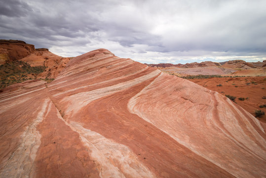 The curves and stripes that were formed by the winds and water over time at the Valley of Fire in Moapa, Nevada. Close to Las Vegas