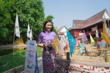 Young Thai girl at temple in songkran festival ,Chiangmai Thailand.