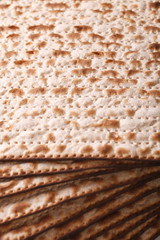 Jewish matzo Flatbread texture close-up, vertical
