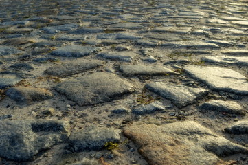 Surface of the old paving stone street
