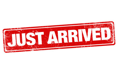 JUST ARRIVED red stamp on white background