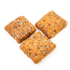 Fresh baked bread or bun with sesame and sunflower seeds topping