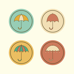 Four cute umbrella round icons
