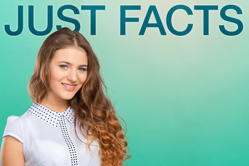 Portrait of an attractive fashionable young brunette woman under "Just facts" inscription
