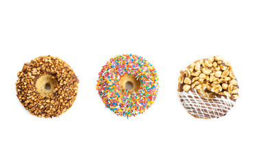 various donuts on white background