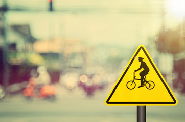 Traffic sign,bicycle sign on blur traffic road