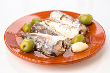 marinated sardines on plate