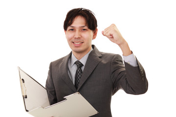 ガッツポーズのビジネスマン