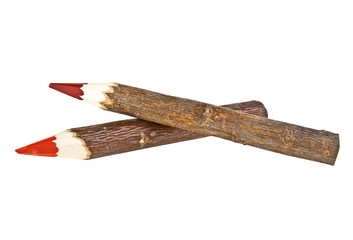 Two bark covered branch colored pencils isolated on white backgr