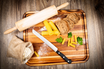 Bread baking set on wooden background