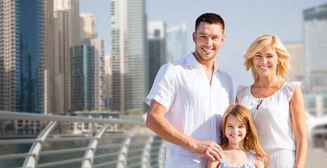 happy family over dubai city street background