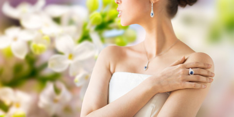 close up of beautiful woman with finger ring