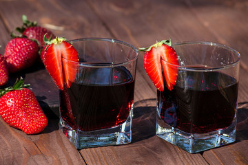 Strawberry and strawberry compote on the table