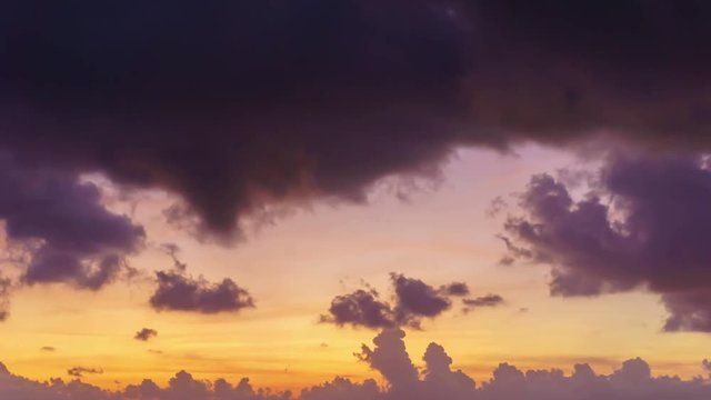 4K/UHD Day to Night Time-lapse : beautiful sunset with fast running clouds.