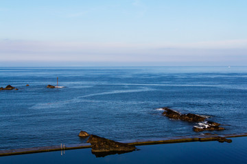 Cornish coastline viewed from the cliff in Bude