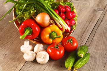 Vegetables . Fresh Bio Vegetable in a Basket. Over Nature Background