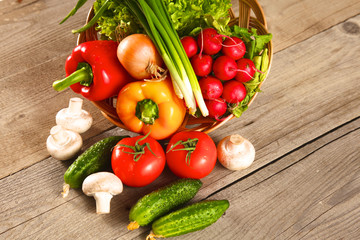 Vegetables . Fresh Bio Vegetable in a Basket. Over Nature Background