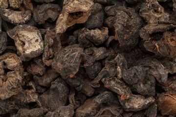 Organic dried Indian gooseberry (Phyllanthus emblica). Macro close up background texture. Top view.