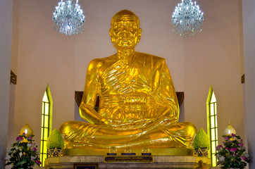 Big golden figure of Phra Mongkol Theb Muni (Luang Poh Wat Pak N