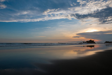 Obraz na płótnie Canvas Colored sunset at Balian beach, Bali, Indonesia