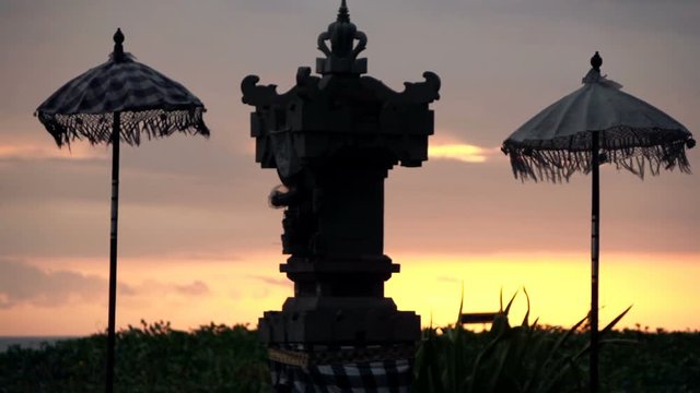 Traditional balinese sculpture during sunset, super slow motion 120fps
