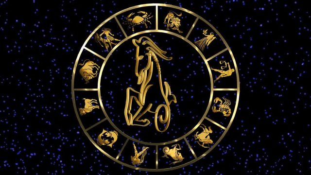 Rotating Golden Zodiac signs on the starry sky