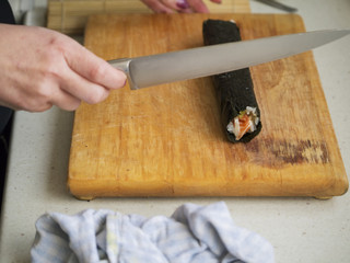 Making sushi: time to cut them.
