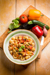 pasta with eggplants zucchinis capsicum and fresh tomatoes