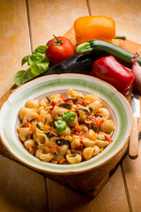 pasta with eggplants zucchinis capsicum and fresh tomatoes