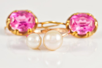 Gold ring with pearls and gold earrings rubies