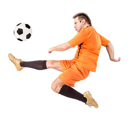 Soccer football player kicking the ball isolated on a white background