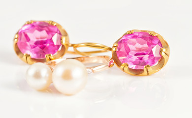 Gold ring with pearls and gold earrings rubies