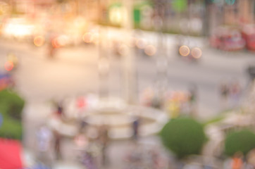 Blur people walking in street with colorful bokeh light abstract background. Travel concept.