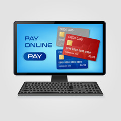 pay online and  online shopping  concept - computer with credit cards on screen 