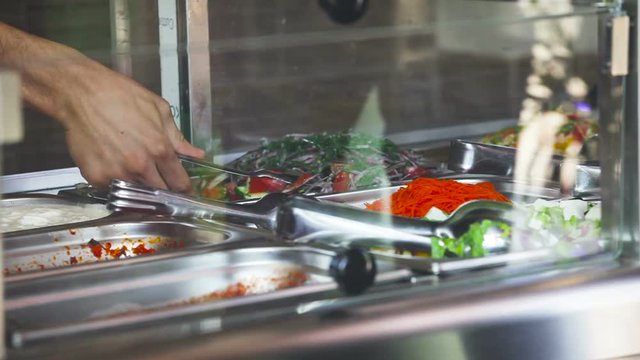Impose Salad. Food Distribution Table. Canteen