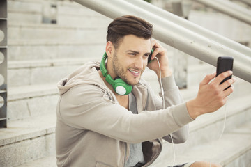 Handsome man video chatting on the phone