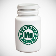Bottle of pills with magnesium Mg