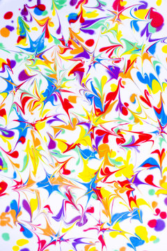 Colorful abstract acrylic painting. Natural dynamic mixture of oil colored pigments fluid flow background.