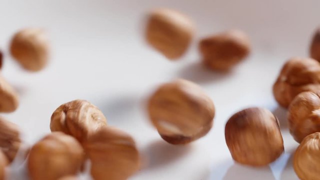 hazelnut falling in 180fps slow motion, prores footage