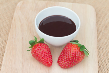 Fresh strawberries serve with melted chocolate