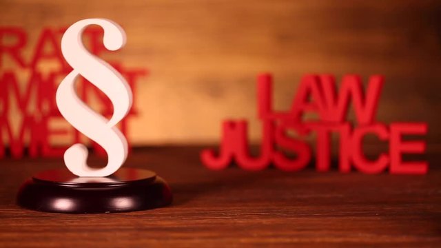 Law, legal code and scales of justice