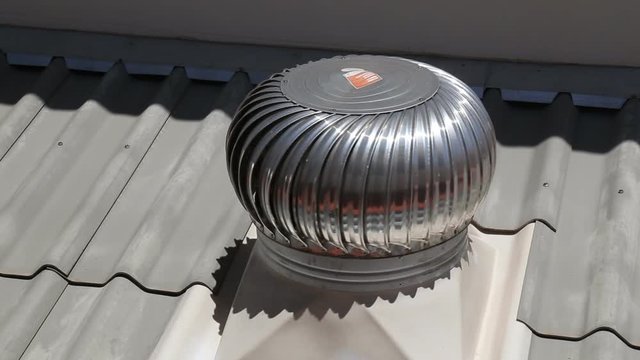 Stainless steel exhaust fan on roof