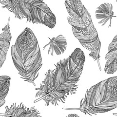 Feather seamless pattern. Vector patterned feathers on white background.